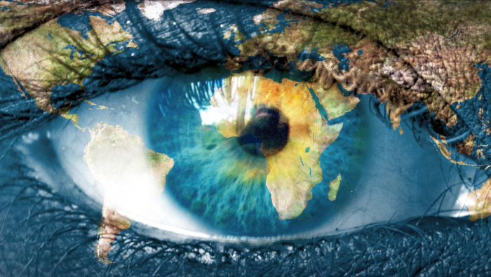 Planet earth and blue human eye 700